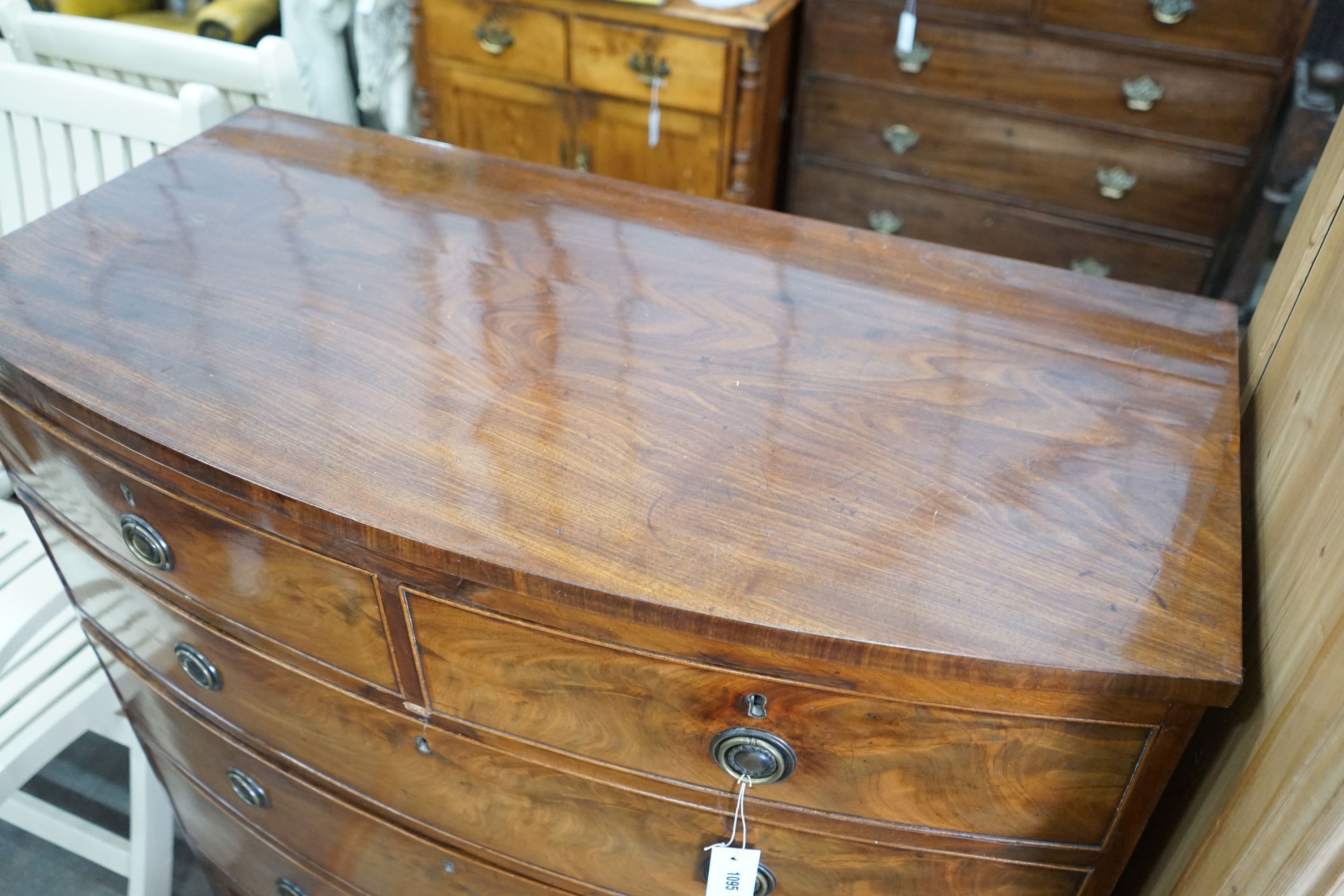 A Regency mahogany bow front chest, width 106cm, depth 53cm, height 104cm